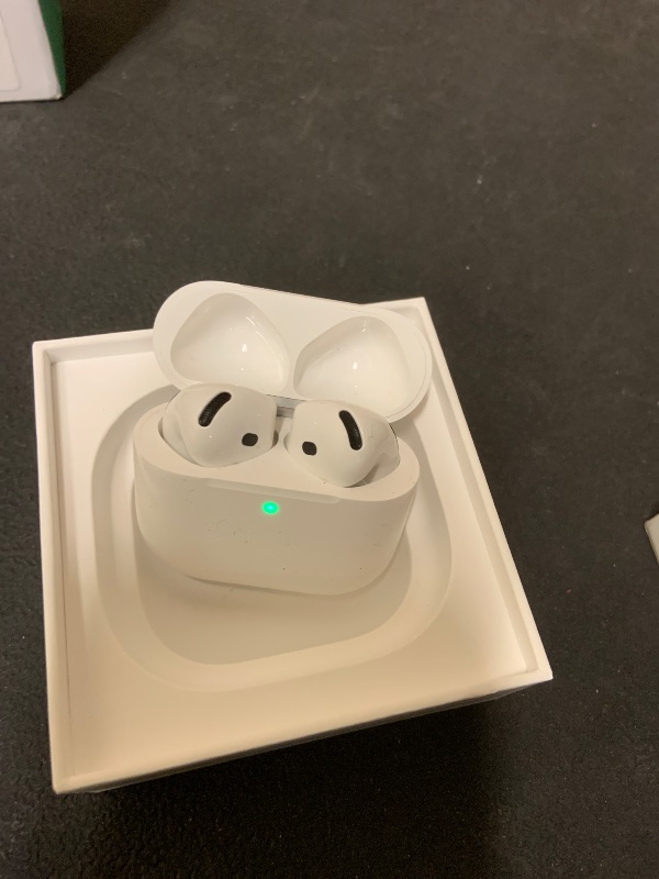 Photo 1 of Apple AirPods 4 Wireless Earbuds, Bluetooth Headphones, with Active Noise Cancellation, Adaptive, Transparency Mode, Personalized Spatial Audio, USB-C Charging Case, Wireless Charging, H2 Chip