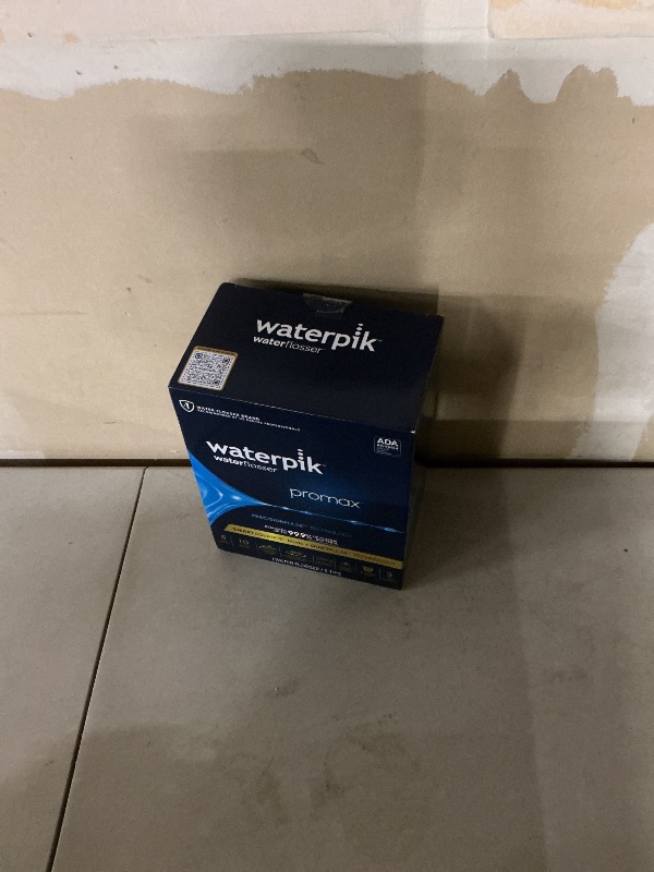 Photo 1 of Waterpik Promax Water Flosser with SmartAdvance Mode for Daily Gum Health and Cleaning Teeth, Braces, Implants, ADA Accepted, Small Quiet Design, Electric Flosser with 10 Settings, 5 Tips, WF-23