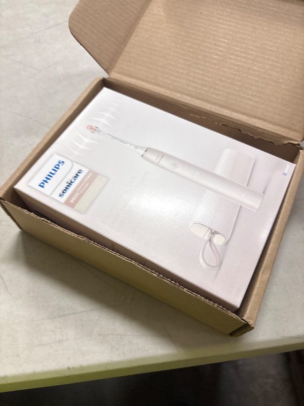 Photo 1 of Philips Sonicare DiamondClean 9900 Prestige Electric Toothbrush - with SenseIQ Technology and Advanced AI App, 5 Brushing Modes, 3 Intensity Levels, Charging Travel Case, Champagne, BD9001AZ