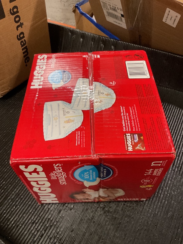 Photo 1 of Huggies Size Newborn Diapers, Little Snugglers Baby Diapers, Size Newborn (up to 10 lbs), 144 Count, Packaging May Vary
