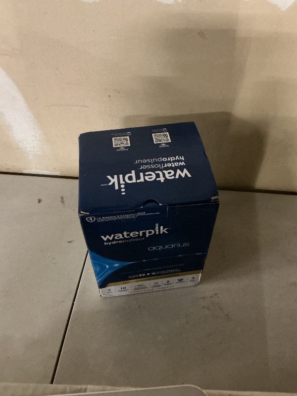 Photo 1 of Waterpik Aquarius Countertop Water Flosser with 10 Settings, 7 Tips, Blue