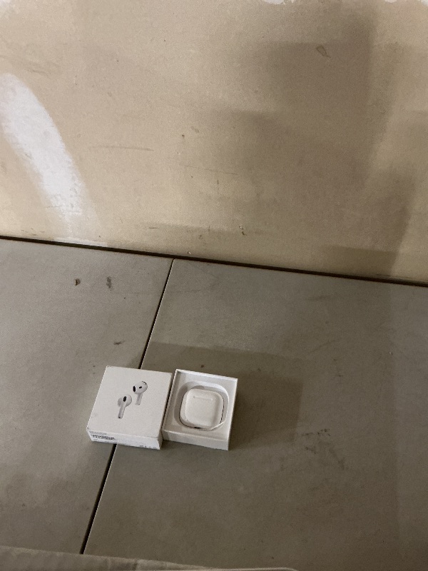 Photo 1 of Apple AirPods 4 Wireless Earbuds, Bluetooth Headphones, with Active Noise Cancellation, Adaptive, Transparency Mode, Personalized Spatial Audio, USB-C Charging Case, Wireless Charging, H2 Chip