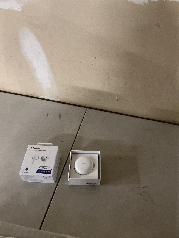 Photo 1 of LG Tone Free FP9W - Active Noise Cancelling True Wireless Bluetooth Earbuds with Plug & Wireless Connection, UVnano Charging Case, Flex Action Bass ™, and IPX4 Water Resistant (White)