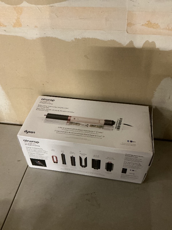 Photo 1 of Dyson Airwrap Co-anda2x Multi-Styler and Dryer Straight+Wavy in Ceramic Pink