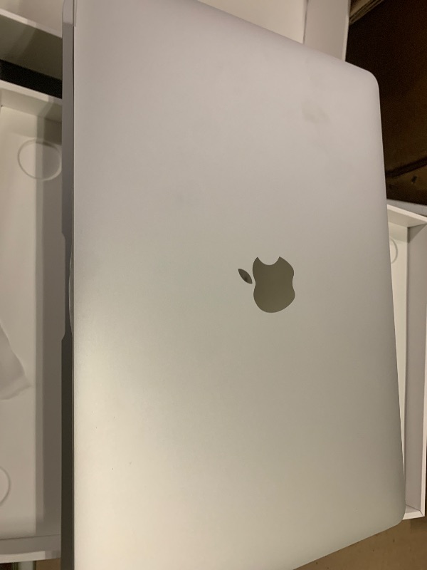 Photo 1 of 2020 Apple MacBook Air Laptop: Apple M1 Chip, 13” Retina Display, 8GB RAM, 256GB SSD Storage, Backlit Keyboard, FaceTime HD Camera, Touch ID. Works with iPhone/iPad; Silver