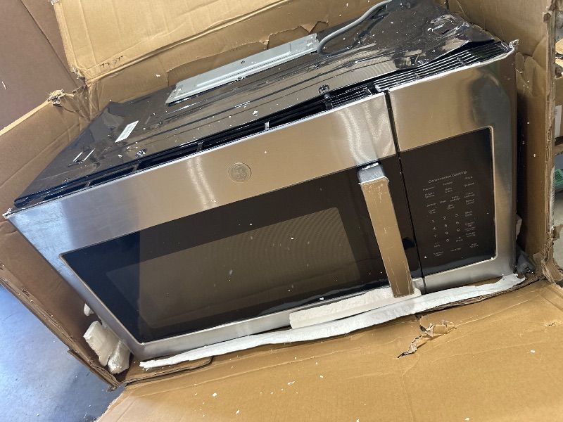 Photo 1 of *** PARTS ONLY *** GE Over-the-Range Microwave Oven with Recirculating Venting, 1.8 Cu. FT, 900W, 12.8” Removable Turntable, 10 Power Levels, Stainless Steel
