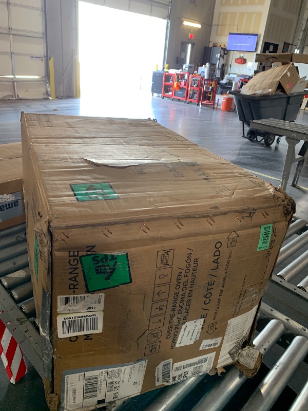 Photo 1 of *** PARTS ONLY *** GE Over-the-Range Microwave Oven with Recirculating Venting, 1.8 Cu. FT, 900W, 12.8” Removable Turntable, 10 Power Levels, Stainless Steel