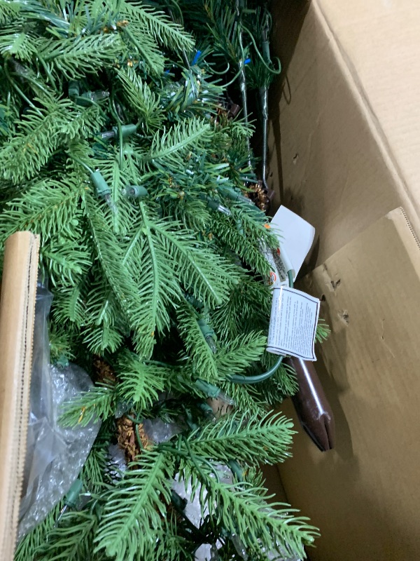 Photo 1 of National Tree Company 'Feel Real' Pre-lit Artificial Christmas Tree | Includes Pre-strung White Lights and Stand | Norwegian Spruce - 7.5 ft