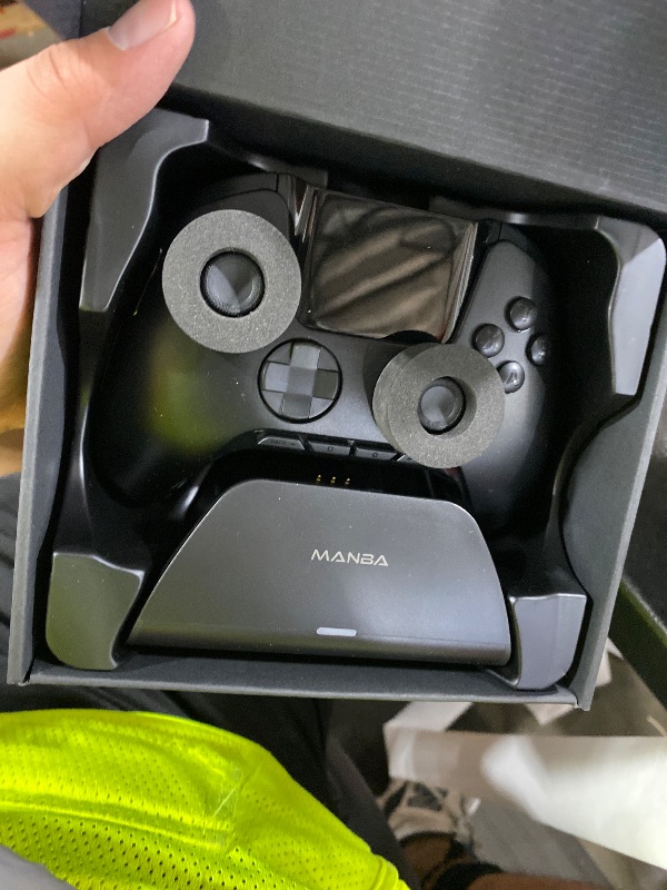 Photo 1 of ManbaOne Interactive Screen Wireless Gaming Controller for PC/Switch/Switch 2/iOS/Android,Hall Effect Stick & Trigger,RGB Lighting,Remappable Buttons,1800mAh with Charging Dock (Black)