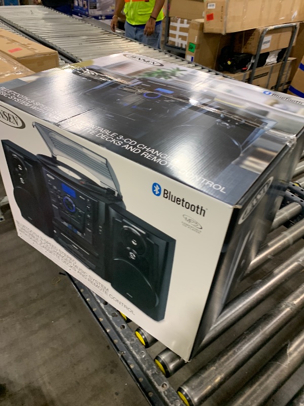 Photo 1 of JENSEN® Bluetooth® 3 Speed Stereo Turntable 3 CD Changer Music System with Dual Cassette Deck, Pitch Control and Remote Control