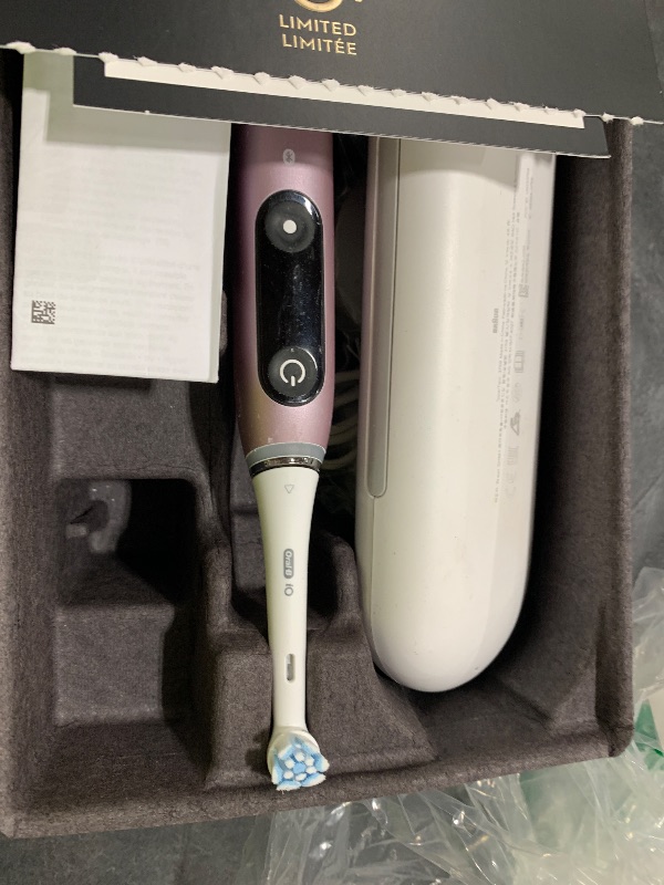 Photo 1 of Oral-B Rechargeable Electric Toothbrush, iO9 Limited Ultimate Clean, 7 Cleaning Modes, Interactive Display, iSense Charger, Charging Travel Case, Visible Pressure Sensor, 3 Brush Heads, Rose Quartz