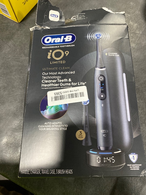 Photo 1 of Oral-B Rechargeable Electric Toothbrush, iO9 Limited Ultimate Clean, 7 Cleaning Modes, Interactive Display, iSense Charger, Charging Travel Case, Visible Pressure Sensor, 3 Brush Heads, Black