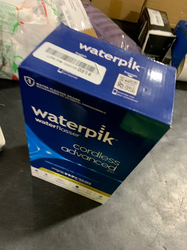 Photo 1 of Waterpik Cordless Advanced 2.0 Water Flosser For Teeth, Gums, Braces, Dental Care With Travel Bag and 4 Tips, ADA Accepted, Rechargeable, Portable, and Waterproof, White WP-580, Packaging May Vary
