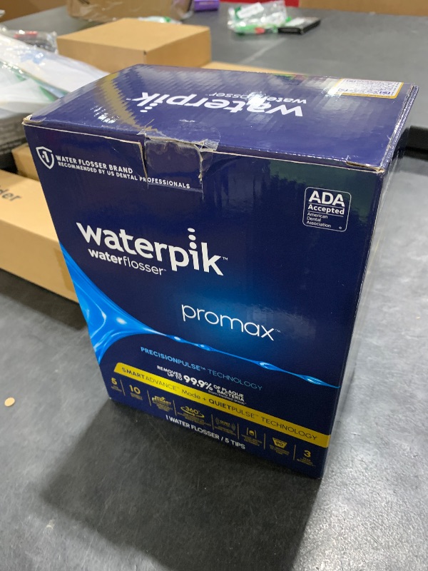 Photo 1 of Waterpik Promax Water Flosser with SmartAdvance Mode for Daily Gum Health and Cleaning Teeth, Braces, Implants, ADA Accepted, Small Quiet Design, Electric Flosser with 10 Settings, 5 Tips, WF-23