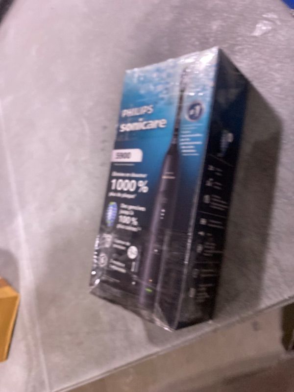 Photo 1 of Philips Sonicare 5900 Series Electric Toothbrush, Pressure Sensor, 6 Brushing Settings, SmarTimer, BrushPacer, 21-Day Runtime, Gentle Professional-Clean Feel, for Sensitive Gums, Black, HX7131/02