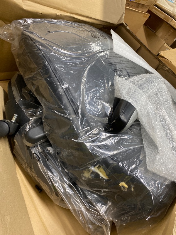 Photo 1 of *Damage to chair cushion* Amazon Basics Executive High Back Office Chair, Adjustable Height, Tilt, Swivel, Padded Seat, Bonded Leather, Wheels, Black/Silver