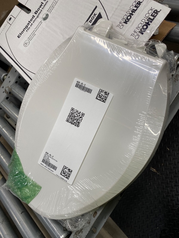 Photo 1 of *Damage to back clip/Unsure if it will work* KOHLER 4636-RL-0 Cachet ReadyLatch Elongated Toilet Seat Slow Close, Soft Close Toilet Seat Quiet Lid, Contoured Grip-Tight Bumpers Installation Hardware, Apartment Essentials, White
