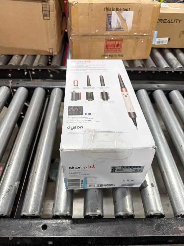 Photo 1 of Dyson Airwrap i.d. Multi-Styler and Dryer and Dyson Chitosan Post-Style Serum Amazon Exclusive