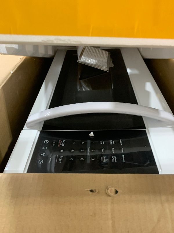Photo 1 of BLACK+DECKER 1.7 Cu.Ft Over-the-Range Microwave Oven, 1000W, White