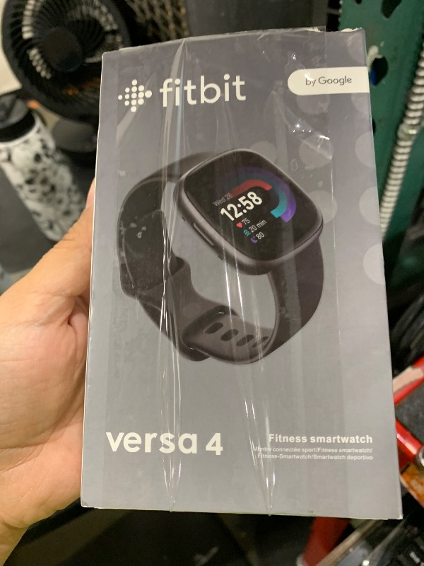Photo 1 of Fitbit Versa 4 Smartwatch - Black/Graphite