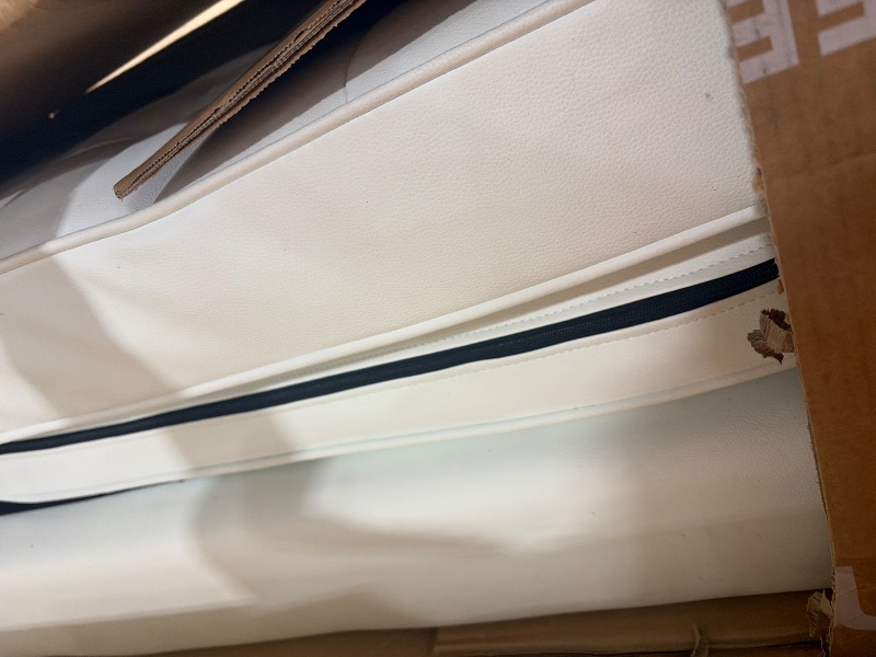 Photo 1 of white leather sofa 
