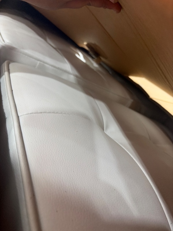 Photo 1 of white leather sofa 