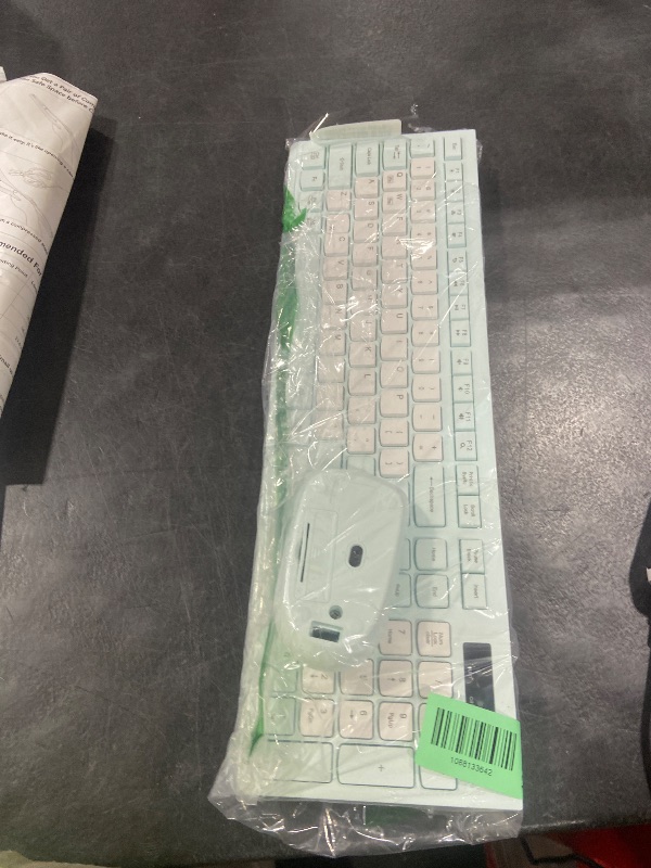 Photo 1 of RECCAZR Wireless Keyboard and Mouse Combo