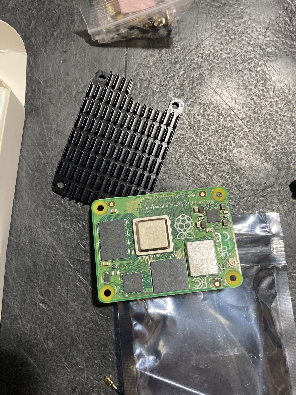 Photo 1 of Waveshare Pi Compute Module 4 Comes with an Official Raspberry Pi CM4104000 (with Wireless, 4GB RAM, Lite Version), an Antenna Kit and a HEATSINK. (3 Items)