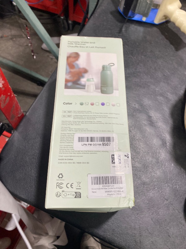 Photo 1 of Momcozy Portable Bottle Warmer