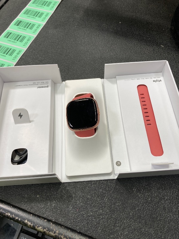 Photo 1 of ** THE SCREEN DISPLAYS NOTHING. THE WATCH WORKS BUT THE SCREEN IS UNVISIBLE.**
Google Fitbit Versa 4 Fitness Smartwatch - Pink Sand/Copper Rose