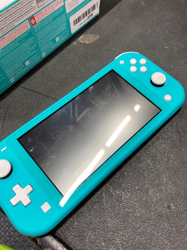 Photo 1 of **WONT CHARGE-NEED TO USE POWER CORD*****Nintendo Switch Lite - Turquoise