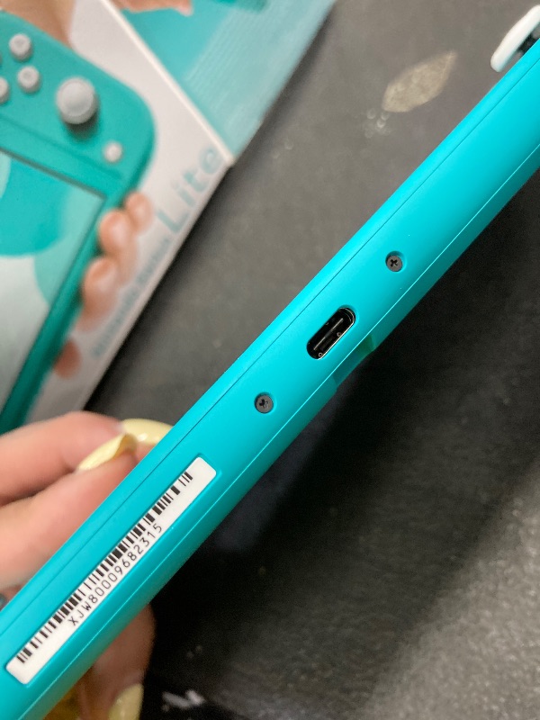 Photo 1 of **WONT CHARGE-NEED TO USE POWER CORD*****Nintendo Switch Lite - Turquoise