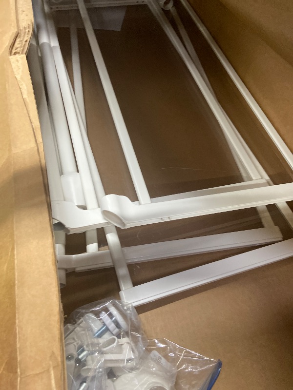 Photo 1 of  refrigerator shelf frame or support structure.