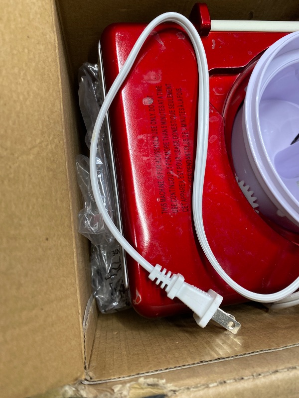 Photo 1 of *Minor damage* Nostalgia Snow Cone Shaved Ice Machine - Retro Table-Top Slushie Machine Makes 20 Icy Treats - Includes 2 Reusable Plastic Cups & Ice Scoop - Retro Red