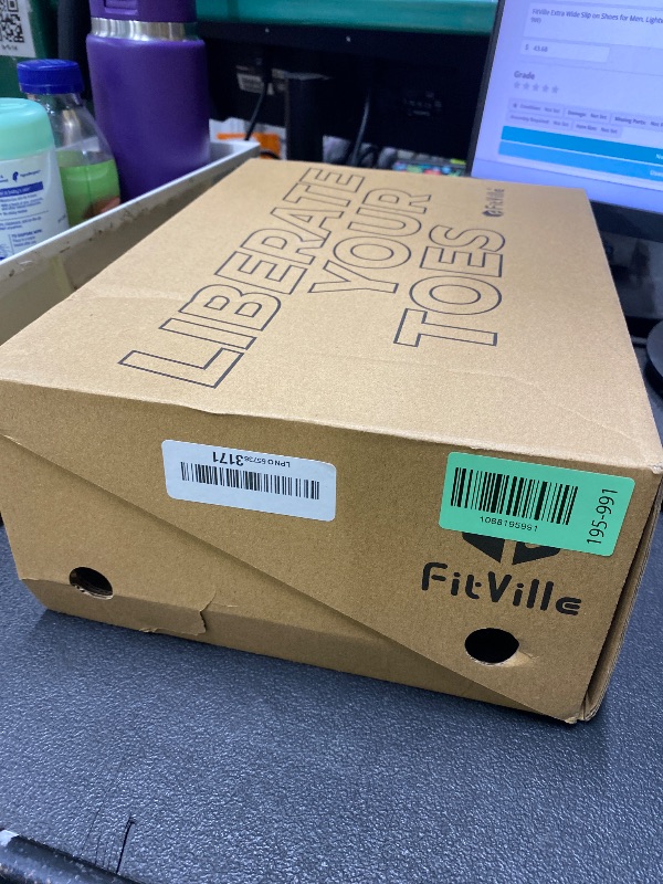 Photo 1 of *Used* FitVille Extra Wide Slip on Shoes for Men, Lightweight and Breathable Mens Wide Slip on Shoes Max Cushioning (Grey, 9W)
