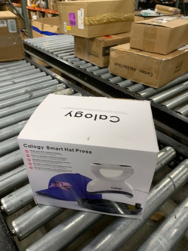 Photo 1 of Calogy Hat Press Heat Machine for Caps, Mini Portable Hat Heat Press with Timer, Max 410?,Precision Temp Control ±5?, Fast & Evenly Heating 2.76*6.3in Curved Plate for 6 1/2-8 hat?21-26 Girth (Blue)