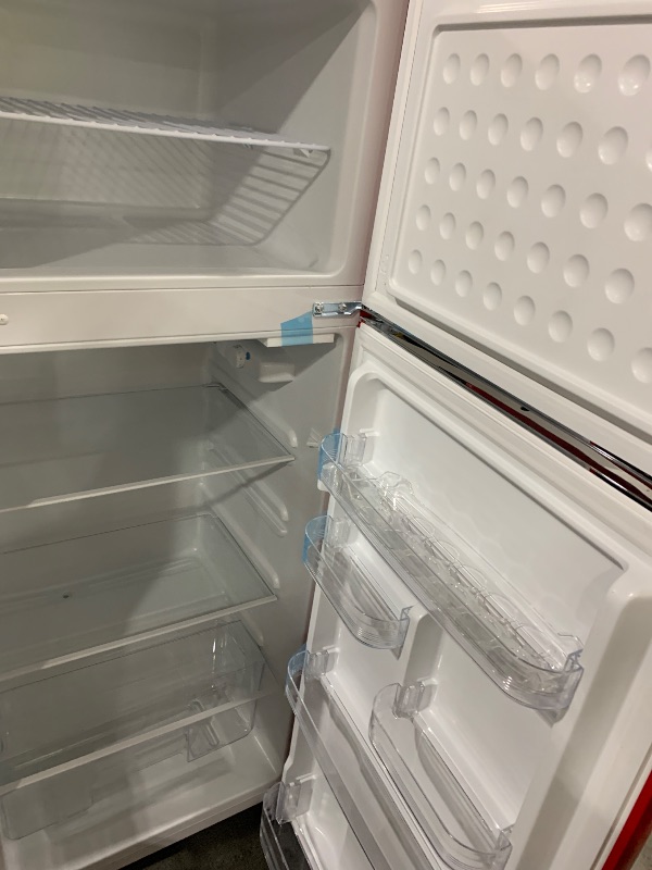 Photo 1 of Frigidaire Retro Top Mount Upright Fridge-Freezer Combo, Apartment Size Fridge with Freezer 7.5 cu. ft. capacity - 23.2" D x 21.5" W x 55.5" H (Red)