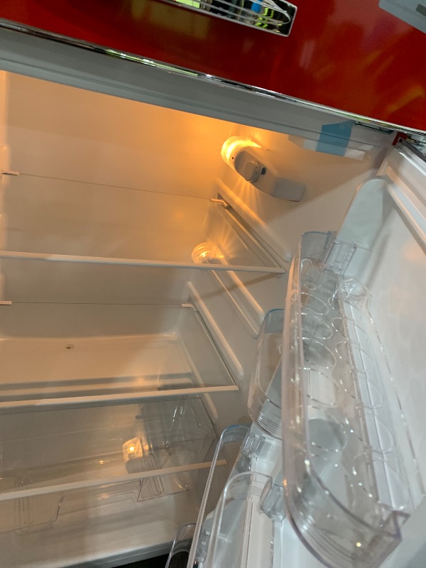 Photo 1 of Frigidaire Retro Top Mount Upright Fridge-Freezer Combo, Apartment Size Fridge with Freezer 7.5 cu. ft. capacity - 23.2" D x 21.5" W x 55.5" H (Red)