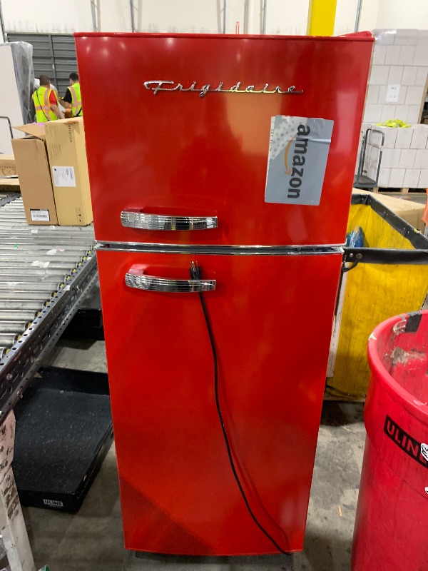 Photo 1 of Frigidaire Retro Top Mount Upright Fridge-Freezer Combo, Apartment Size Fridge with Freezer 7.5 cu. ft. capacity - 23.2" D x 21.5" W x 55.5" H (Red)