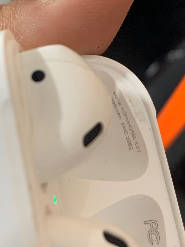 Photo 1 of Apple AirPods Wireless Earbuds with Lightning Charging Case