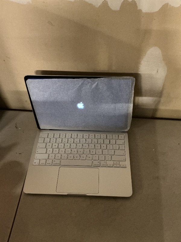 Photo 1 of Grey MacBook neo