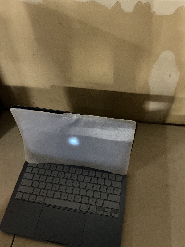 Photo 1 of Blue indigo MacBook neo