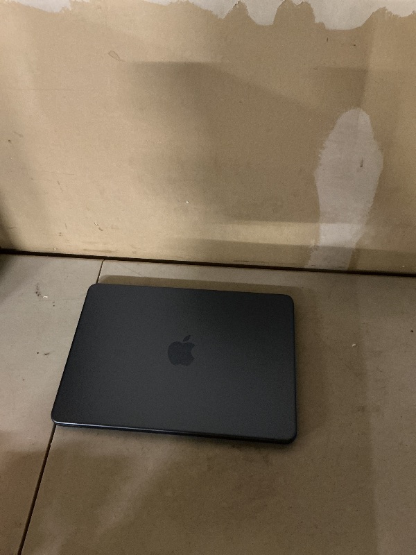 Photo 1 of Blue indigo MacBook neo