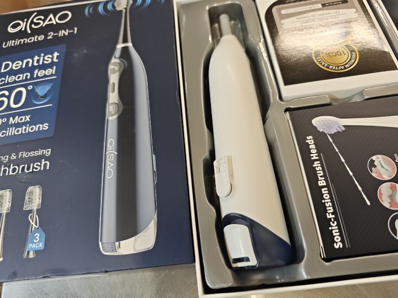 Photo 1 of OILSAO Electric Toothbrush with Water Flosser