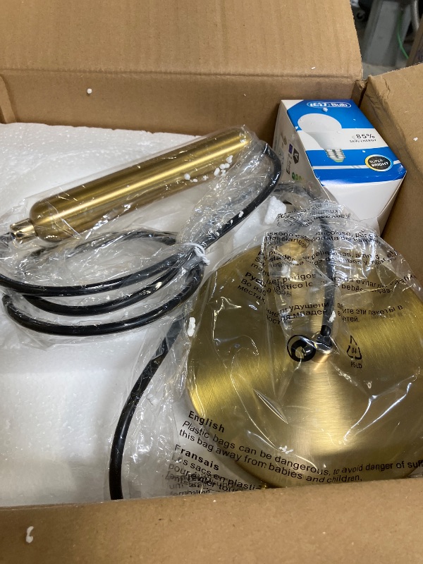 View 3 of Mccokaige 10" Gold Globe Pendant Light