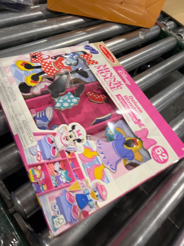 View 2 of Melissa & Doug Disney Minnie & Daisy Magnetic Dress-Up Dolls