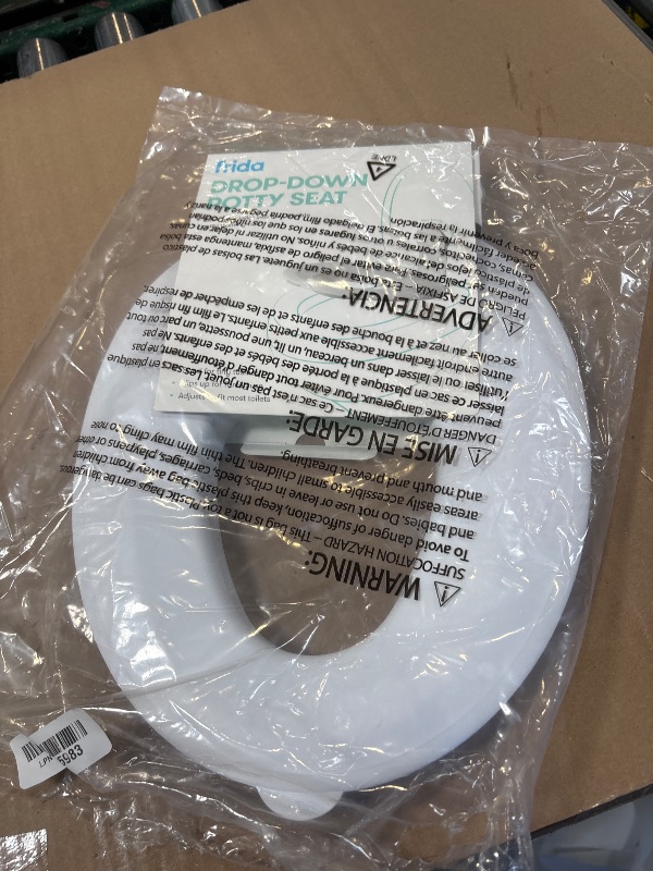Photo 1 of Frida Baby Drop Down Potty Training Seat for Toddlers & Kids, Easy to Clean
