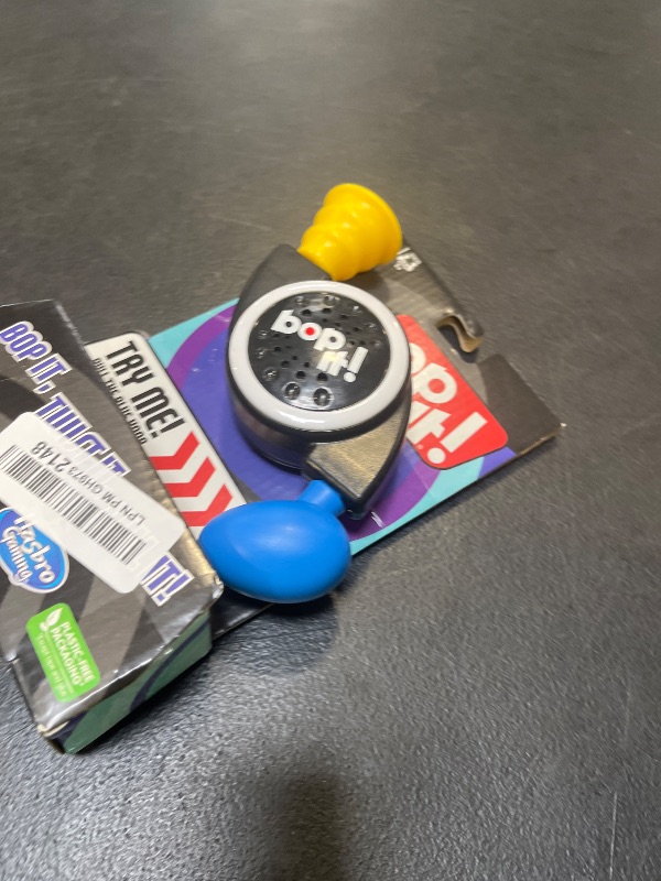 Photo 1 of Hasbro Gaming Bop It! Micro Series Electronic Game for 1 or More Players, Classic Bop It! Gameplay in a Compact Size, Fun Party Game for Kids Ages 8+