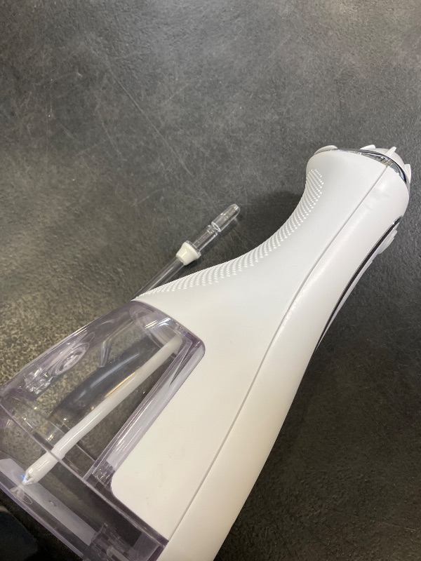 Photo 1 of Waterpik Cordless Advanced Water Flosser - White