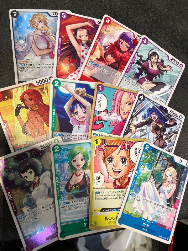 Photo 1 of CARD GAME 12 PCS